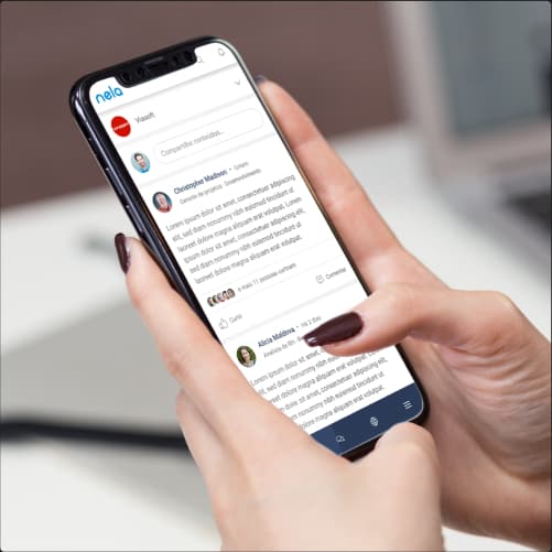 Viasoft Nela platform being used on a smartphone. Person using a smartphone with the Viasoft Nela platform. The phone screen shows the Nela platform interface.